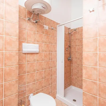 Terrazza Privata, Pochi Passi Dalla Porto Taverna Apartmán Vaccileddi